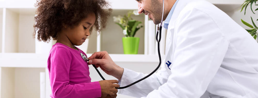 child getting a wellness checkup from a pediatrician at ExperCARE